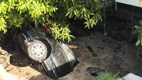 sinkhole, Florida, car swallowed by sinkhole