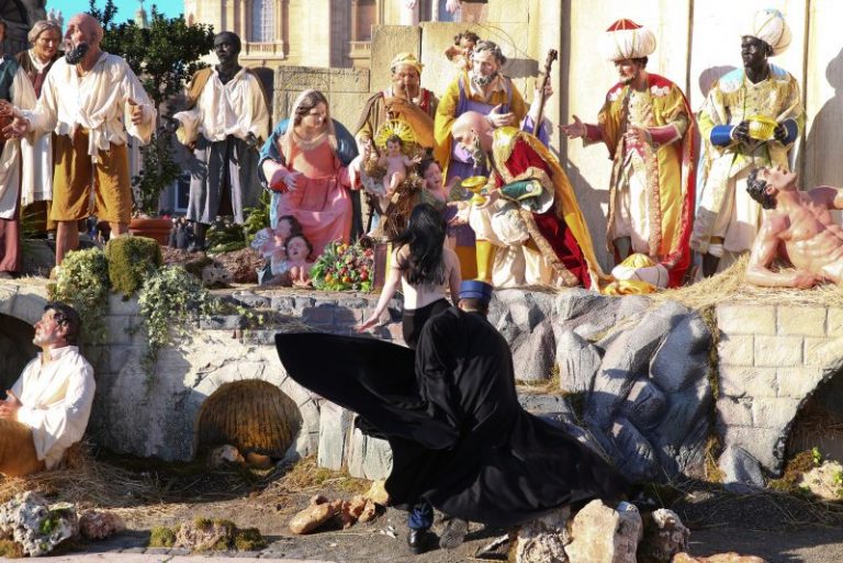 Topless Protestor Tries to Steal Baby Jesus from Vatican Nativity Scene
